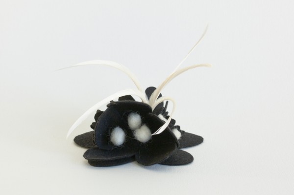 black and white fascinator with feathers